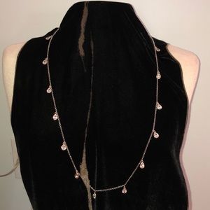 Teardrop CZ in gold-tone bezels, silver-tone chain